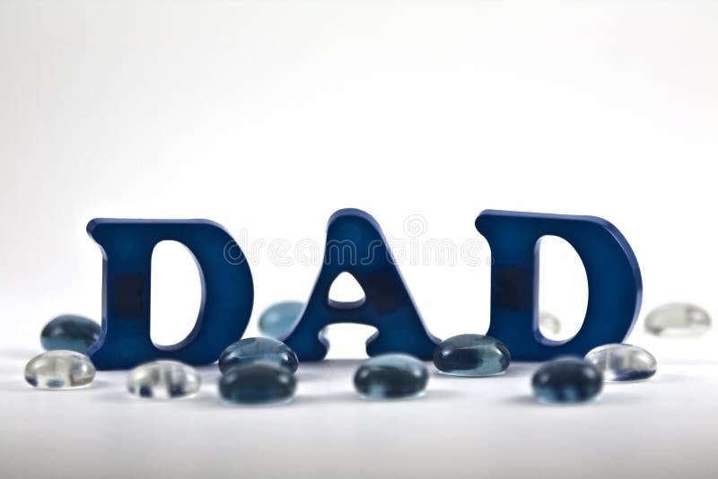 Magnetic letters spelling dad