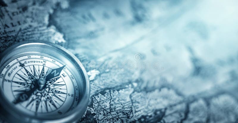 Magnetic old compass on world map.Travel, geography, navigation, tourism and exploration concept background. Macro photo. Very