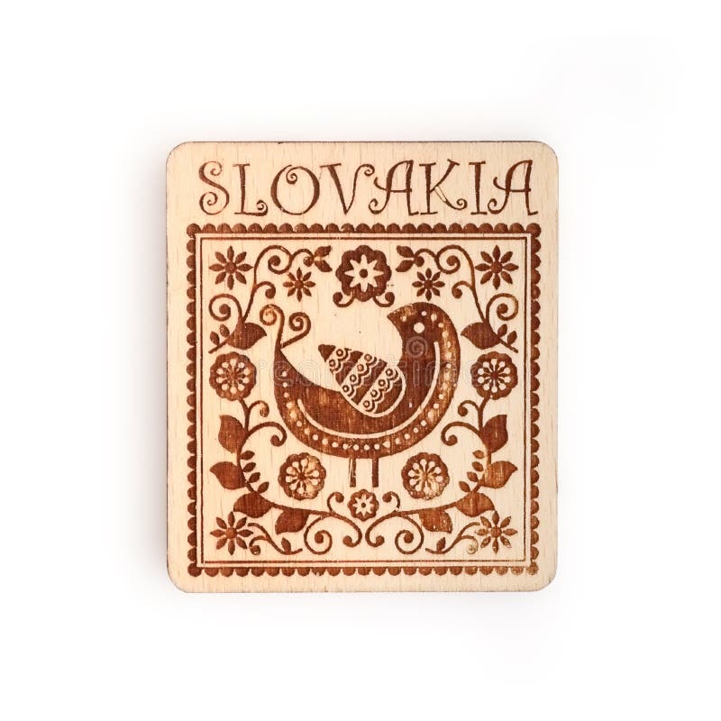 Magnetic souvenir from Slovakia with the image of a traditional ornament isolated on white background. Design element with