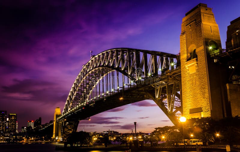 Gorgeous sunset on mighty steel Sydney Harbor bridge crossing the ocean royalty free stock images Gorgeous sunset on mighty steel Sydney Harbor bridge crossing the ocean royalty free stock images