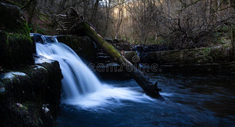 Magnificent long exposure of a waterfall in Brecon Beacons National Park at sunset royalty free stock photo Magnificent long exposure of a waterfall in Brecon Beacons National Park at sunset royalty free stock photo