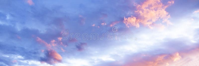 Magnificent pink and white cumulus cloud in blue sky. Australia.