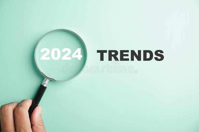 Magnifier Glasses Reveal the Words New Year 2024 Trends Stock Image