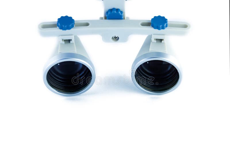 Magnifying Binocular Glasses Closeup. Dental Instruments in the Stock