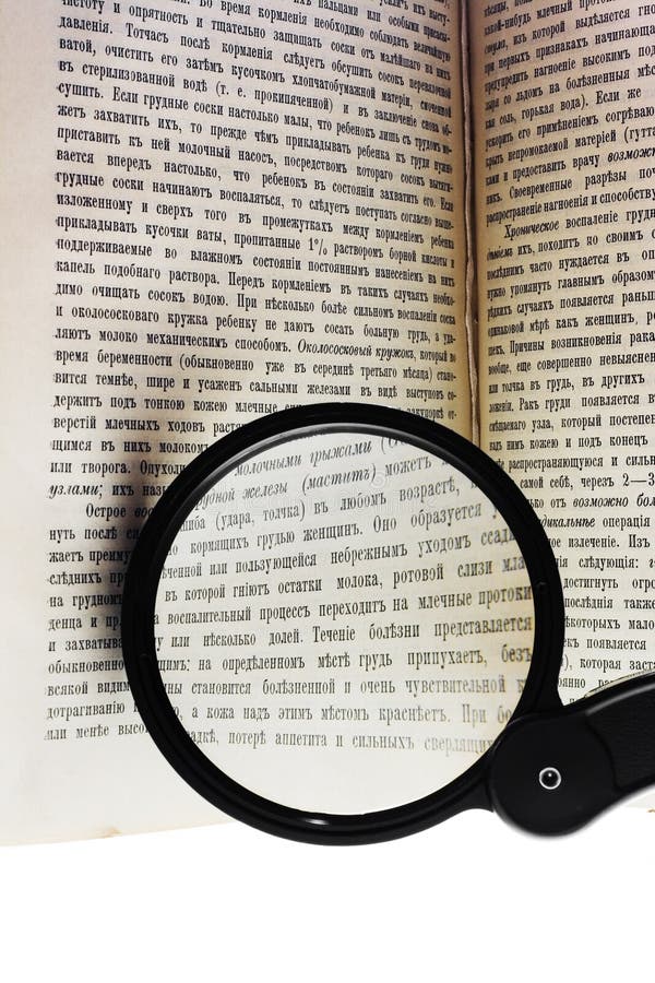 Magnifying Glass on Book stock photo. Image of formation 5931630