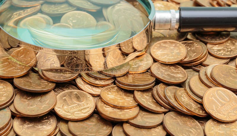 Magnifying Glass on a Coins Stock Photo - Image of abstraction, coins