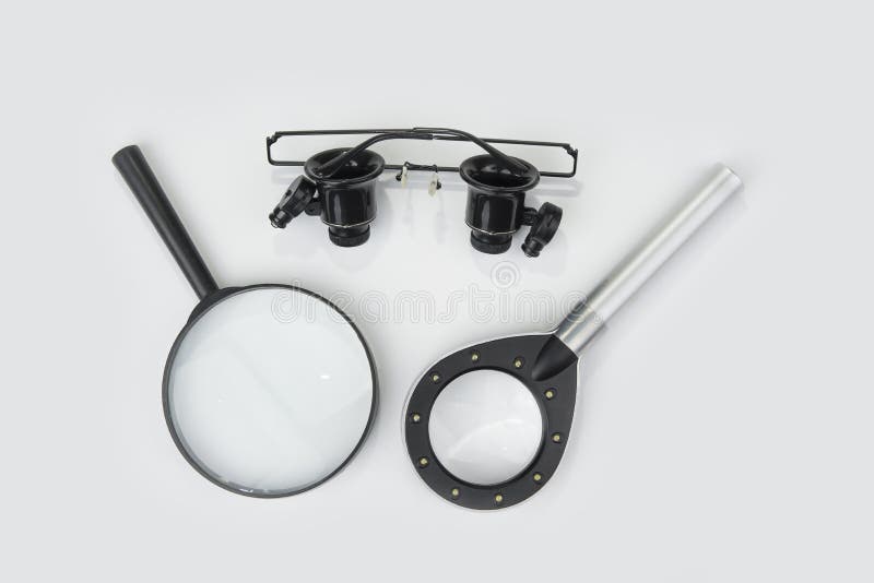 Magnifying Glass and Goggles Glasses on a White Stock Image Image of chain, gold 201798575