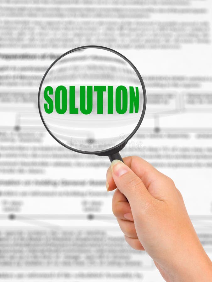 Magnifying glass in hand and word Solution royalty free stock image