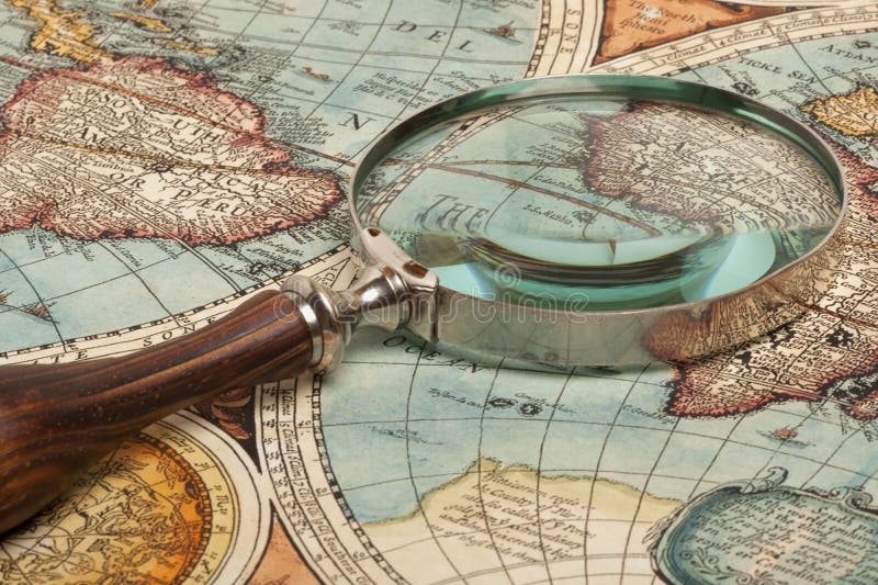 Magnifying glass and map stock photo. Image of printout 66514764