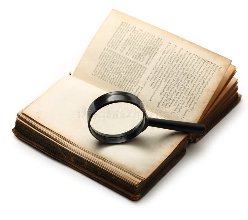 Book and magnifying glass stock photo. Image of learning 12634924