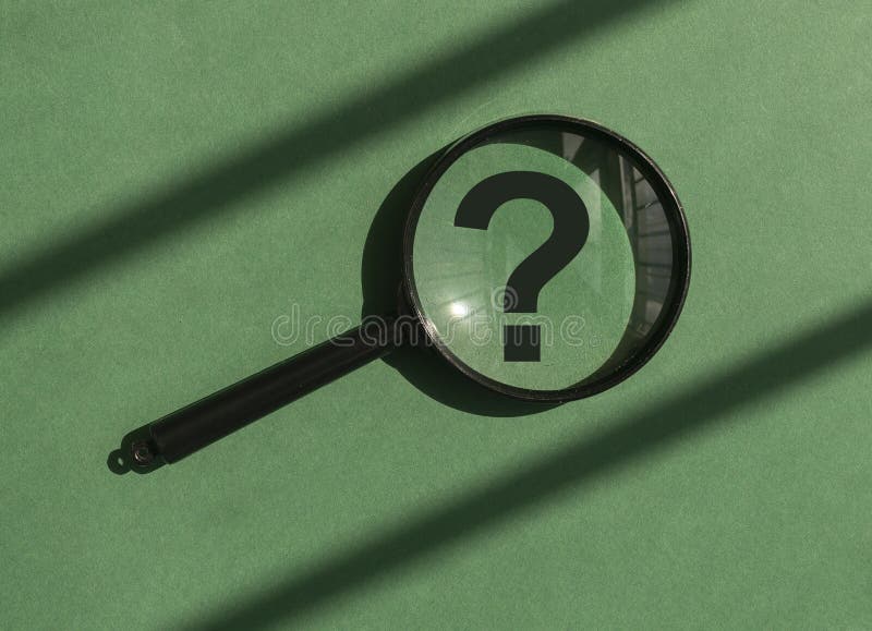 Magnifying glass with question mark inside on green background. Concept of analysis, study, finding answers stock photos