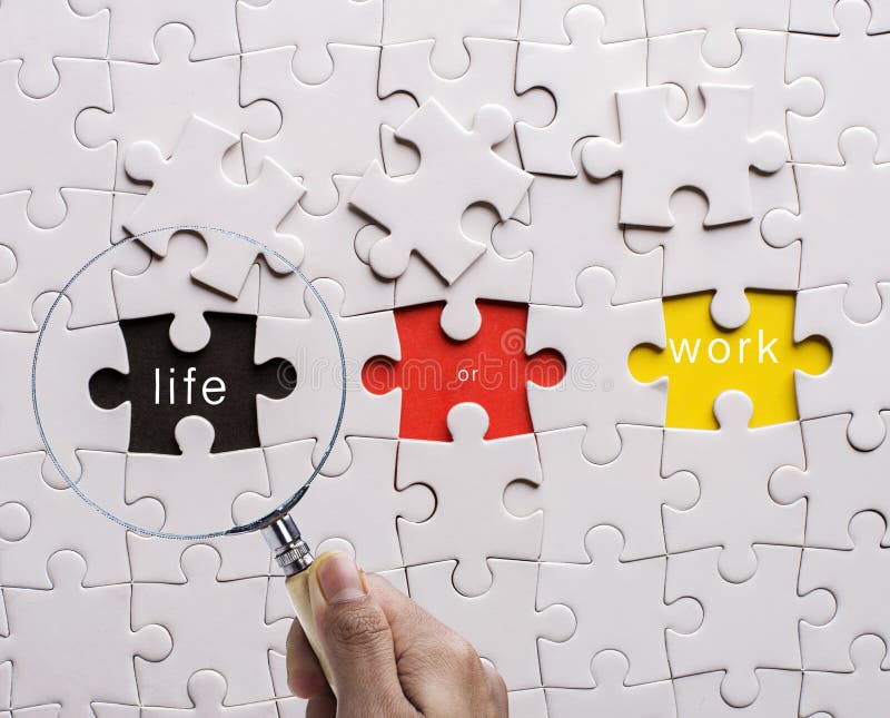 Magnifying glass searching missing puzzle peace LIFE royalty free stock photos