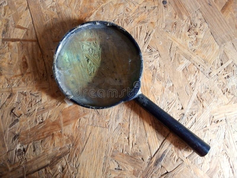 Magnifying Glass on Wood Surface Stock Photo Image of brown