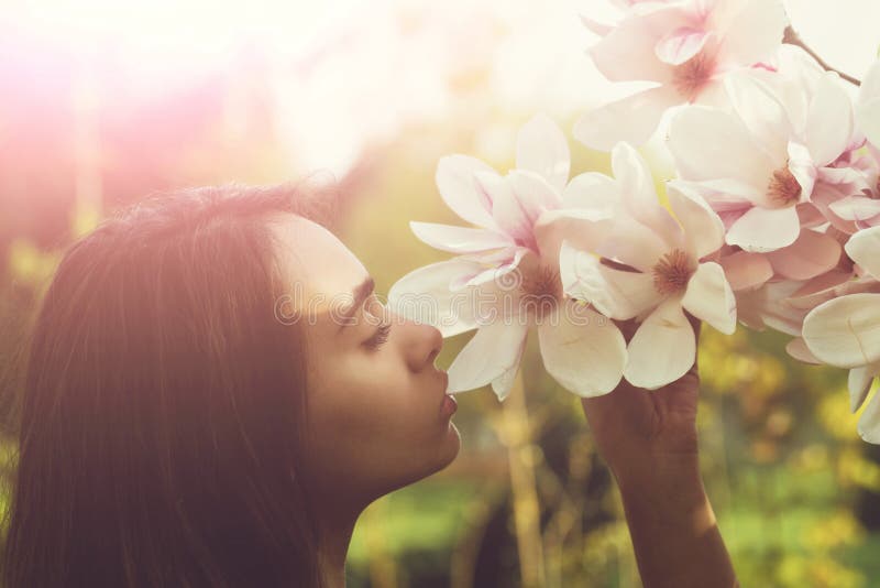 Magnolia flowers and woman or pretty girl. Spring stock photography Magnolia flowers and woman or pretty girl. Spring stock photography