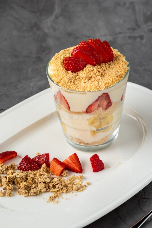 Magnolia Pudding with Walnuts in Glass Bowl. Stock Photo Image of