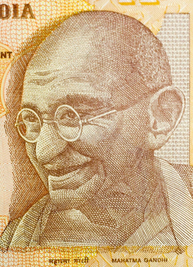 Close-up of ten Indian rupees banknote. Features Mahatma Gandhi.