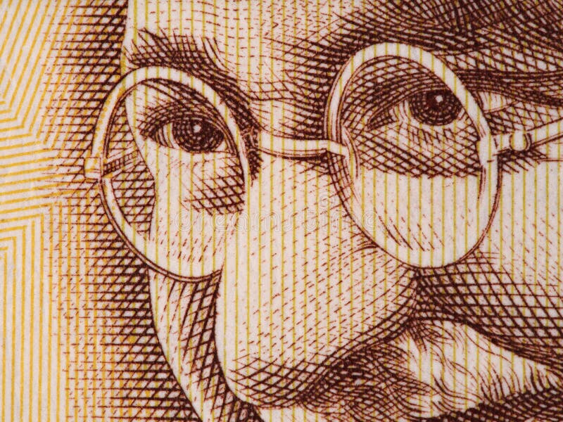 Mahatma Gandhi face on indian 500 rupee banknote extreme macro, India money closeup