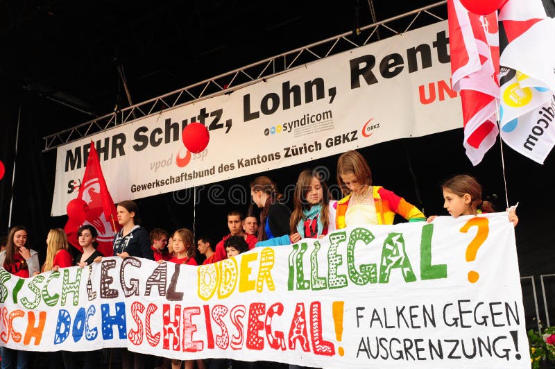 1. Mai: young female protestors demanding for more humanity for immigrants stock photography 1. Mai: young female protestors demanding for more humanity for immigrants stock photography