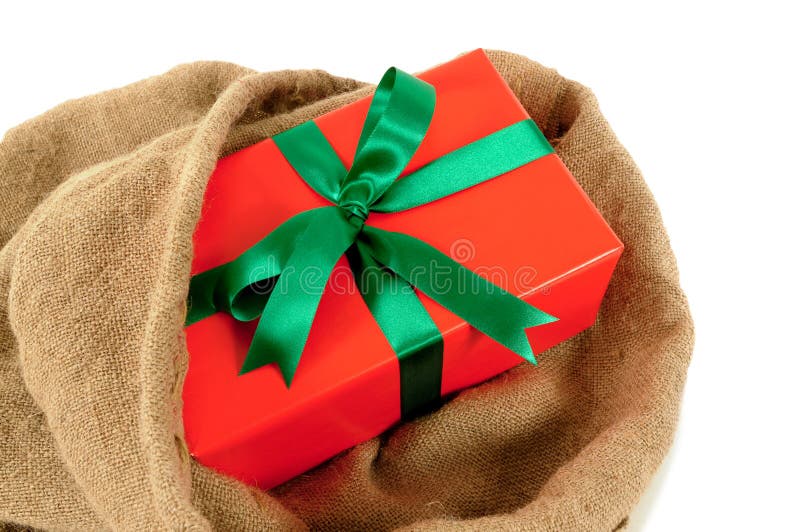 Mail bag or sack with small red Christmas gift isolated on white background. Mail bag or Santa sack with small red Christmas gift isolated on white background royalty free stock image Mail bag or sack with small red Christmas gift isolated on white background. Mail bag or Santa sack with small red Christmas gift isolated on white background royalty free stock image