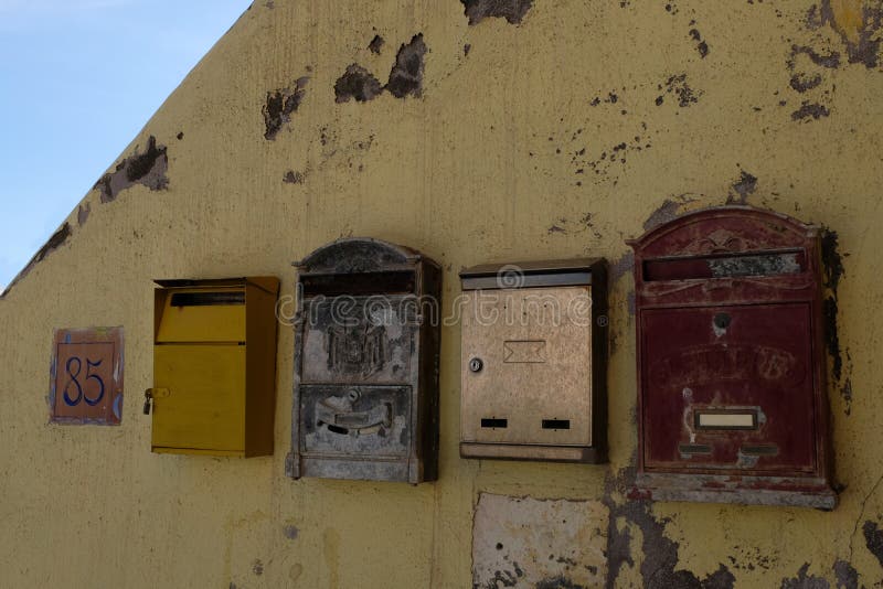 Mailboxes on a wall stock photo Mailboxes on a wall stock photo