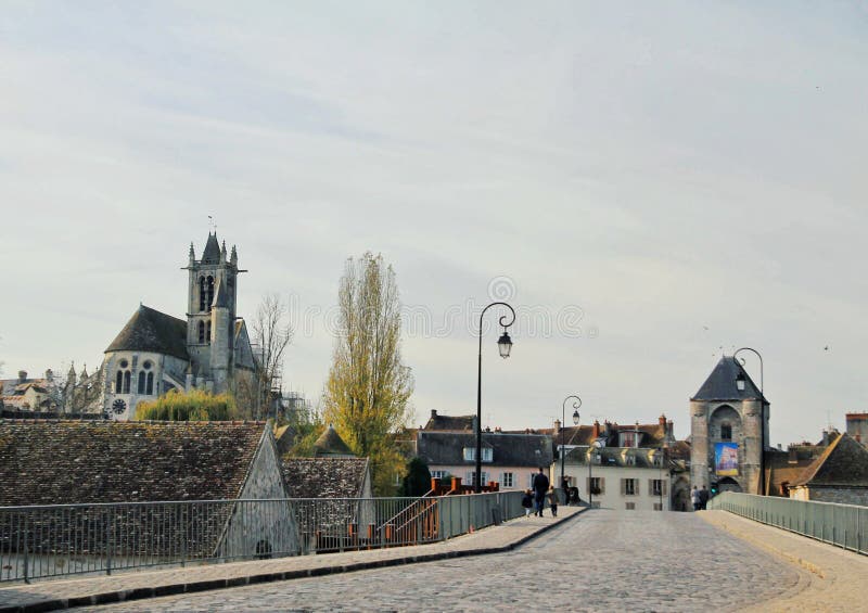 Main bridge and the city gate, City of Moret-Sur-Loign, France royalty free stock photos Main bridge and the city gate, City of Moret-Sur-Loign, France royalty free stock photos