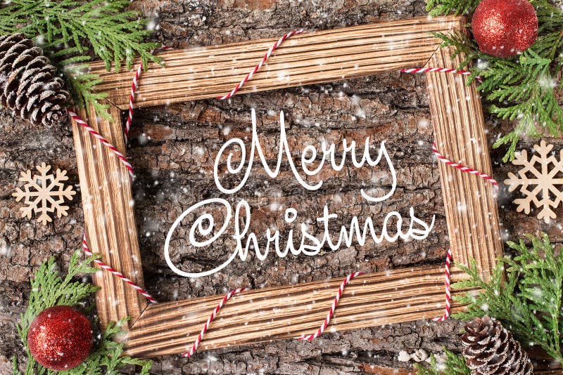 Main de carte de vacances de Joyeux Noël marquant avec des lettres Noël photographie stock Main de carte de vacances de Joyeux Noël marquant avec des lettres Noël photographie stock