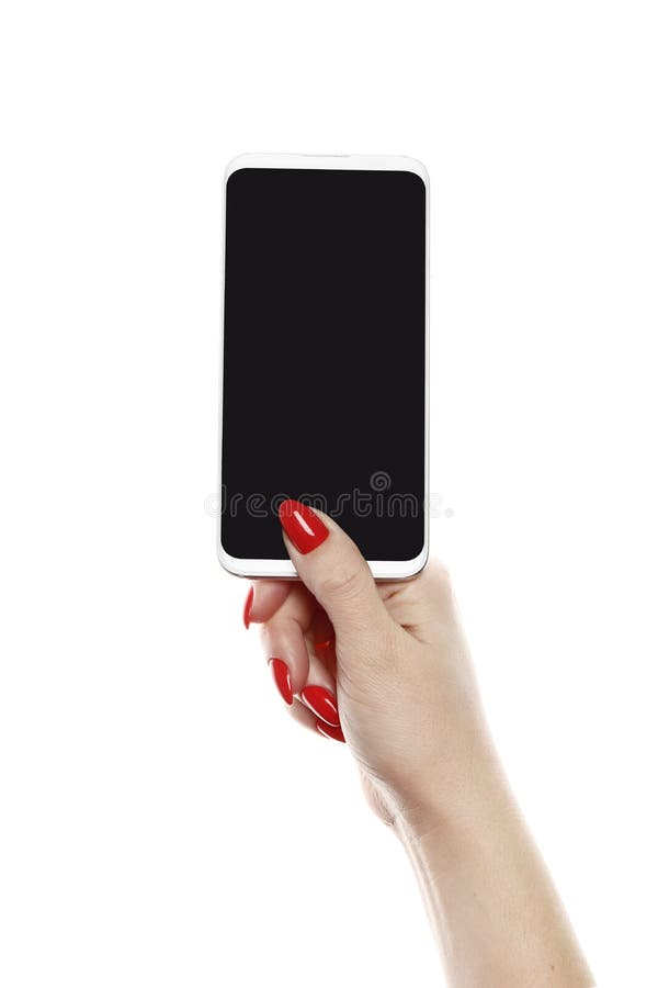 Main de femme jugeant le smartphone d'isolement sur le fond blanc Manucure rouge image libre de droits Main de femme jugeant le smartphone d'isolement sur le fond blanc Manucure rouge image libre de droits