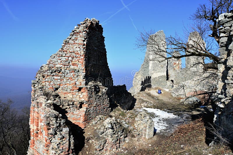 Main entrance to ruins of castle Gymes, Slovakia, remains of tower castle on the left side