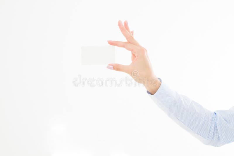 Main femelle jugeant le businesscard d'isolement sur le fond blanc images stock Main femelle jugeant le businesscard d'isolement sur le fond blanc images stock