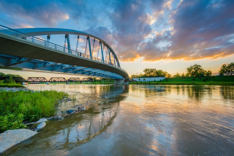 The Main Street Bridge and Scioto River at sunset, in Columbus, Ohio