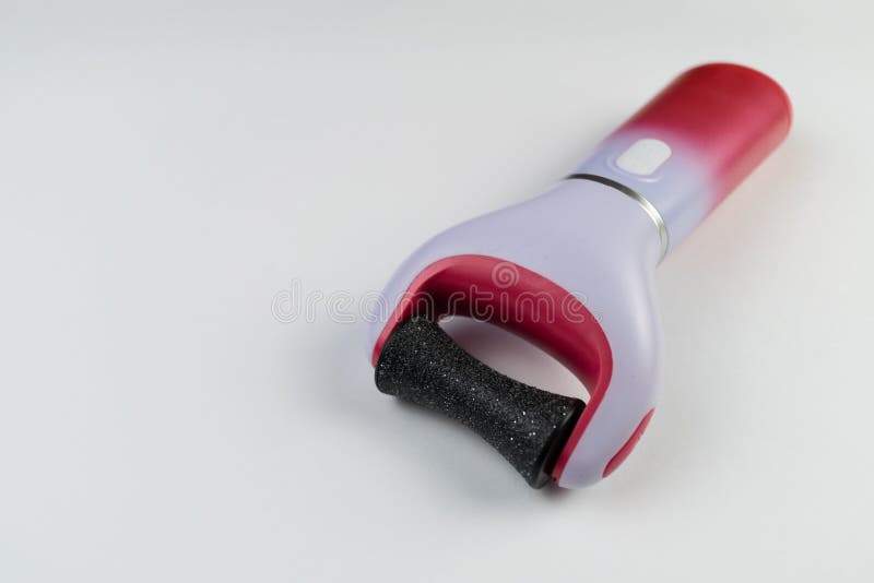 The main subject is out of focus, electric callus remover machine white background closeup remove old skin care treatment health hygiene