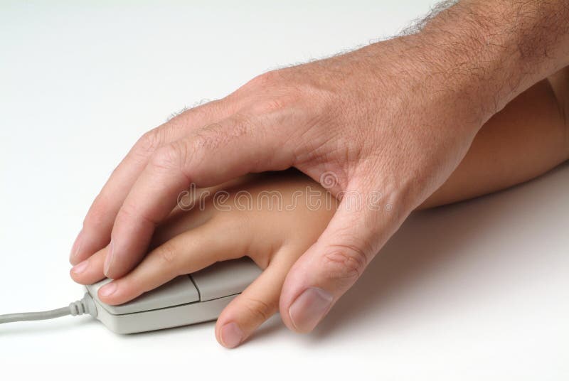 Mains sur la souris image libre de droits
