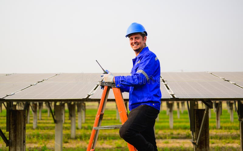 Maintenance Engineer Checking and Installing Solar Panels on Solar Cell