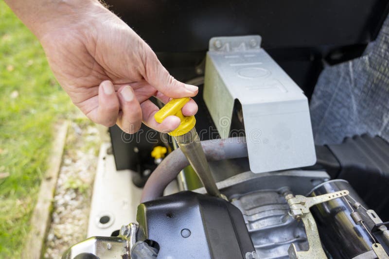 Maintenance, Mechanic Inspecting the Generator, Checking Oil Level