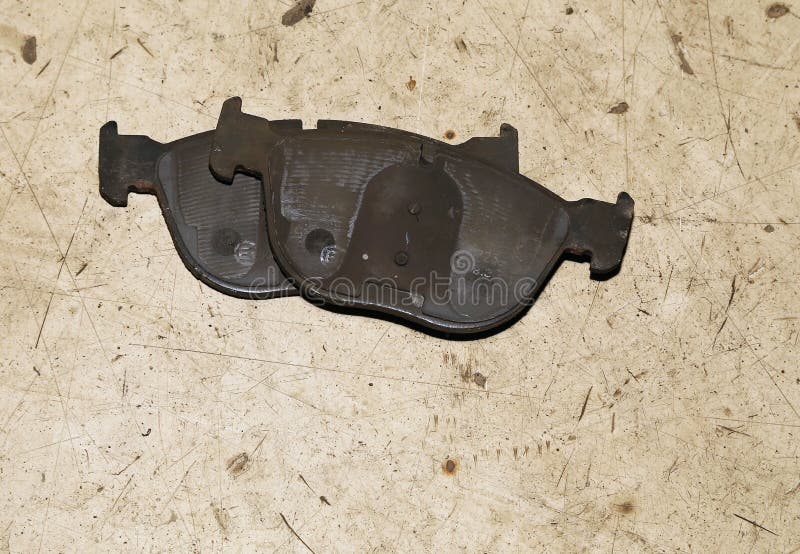 Old Worn Out Brake Pads from a Car on a White Background, Isolate