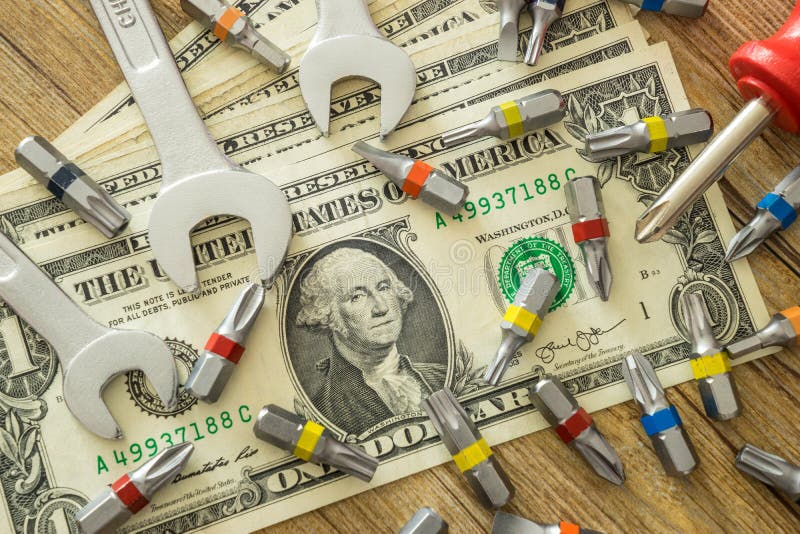 Spanner and dollars stock photo. Image of jackpot, loan - 25132162
