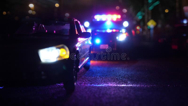 Maintenez l'ordre la voiture de patrouille à la scène du defocus de lentille optique de secours