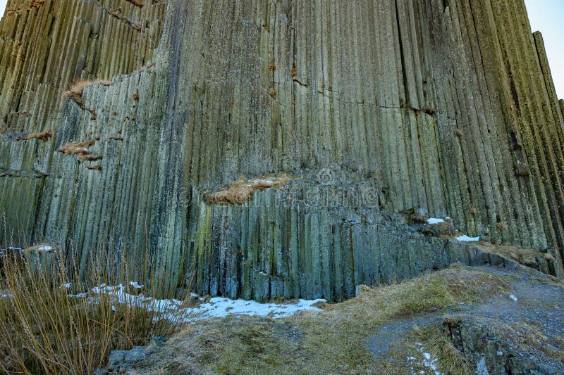Majestic basalt formation with vertical columns in volcanic landscape royalty free stock images