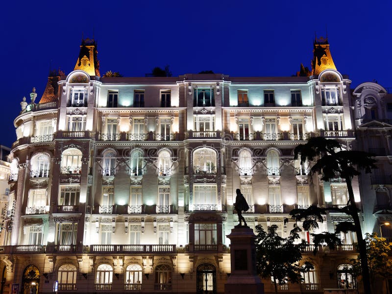 Majestic Building illuminated by night in Madrid Spain royalty free stock photo