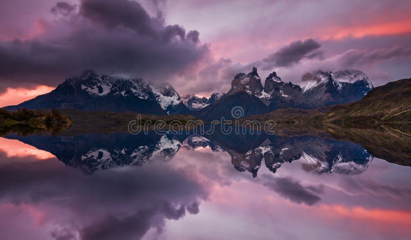 Majestic mountain landscape. Reflection of mountains in the lake. National Park Torres del Paine, Chile.