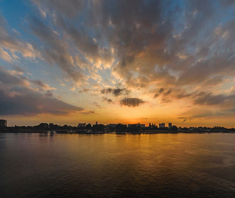 Majestic sunset over the river Scheldt in the Belgian city of Antwerp Antwerpen. With plenty of space for copy and text royalty free stock photos Majestic sunset over the river Scheldt in the Belgian city of Antwerp Antwerpen. With plenty of space for copy and text royalty free stock photos