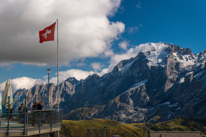 Majestic Swiss Alps With A Swiss Flag In The Foreground Editorial Photo Image Of Clouds Majestic Swiss Alps With A Swiss Flag In The Foreground Editorial Photo Image Of Clouds
