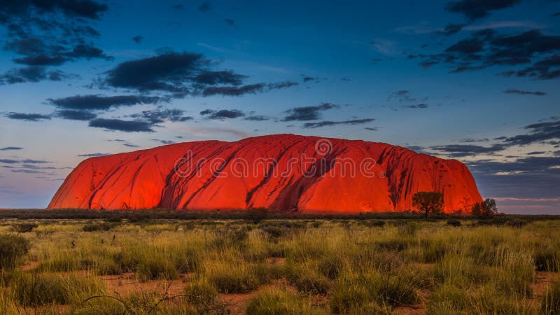 Majestic Uluru at sunset on a clear winter`s evening in the Northern Territory, Australia