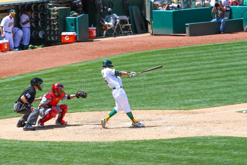 Oakland As hitter outfielder and hitter Josh Reddick swings at a pitch during a Major League Baseball game between the St. Louis Cardinals and the Oakland Athletics in Overstock.com Coliseum in Oakland, California. Oakland As hitter outfielder and hitter Josh Reddick swings at a pitch during a Major League Baseball game between the St. Louis Cardinals and the Oakland Athletics in Overstock.com Coliseum in Oakland, California.