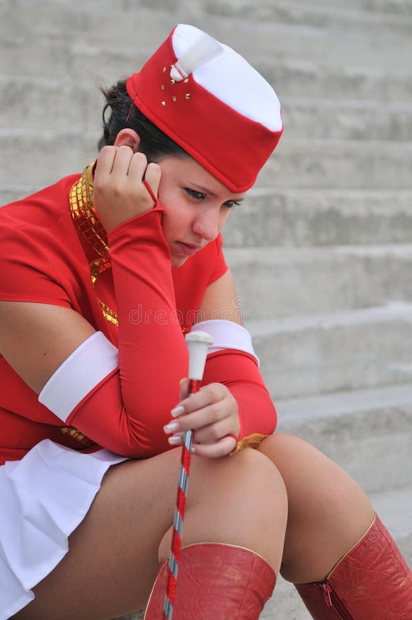 Majorette - unhappy teen in uniform. 