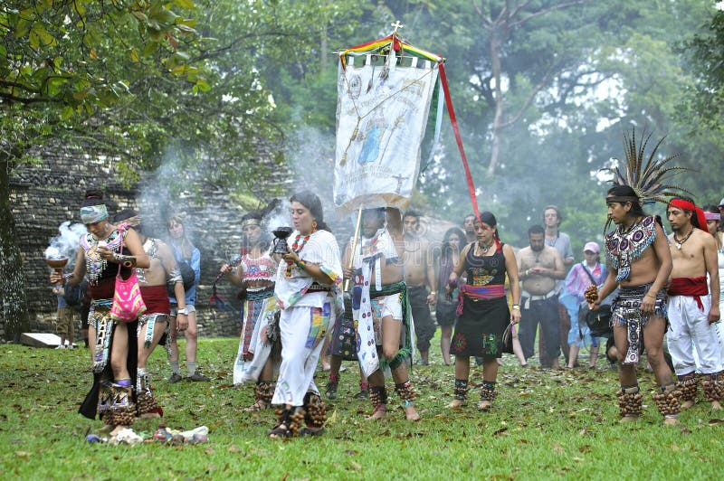 Palenque, Chiapas, Mexico - December 21, 2012: A Maya ceremony combining both elements of traditional culture and Catholicism is performed in Palenque, Chiapas, Mexico in front of the Temple of the Count on December 21, 2012. Palenque, Chiapas, Mexico - December 21, 2012: A Maya ceremony combining both elements of traditional culture and Catholicism is performed in Palenque, Chiapas, Mexico in front of the Temple of the Count on December 21, 2012