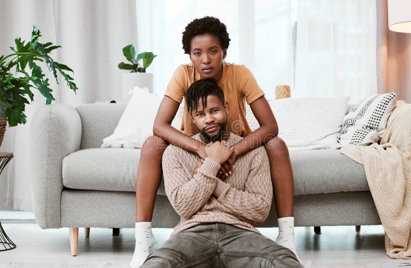 We make a great couple. a young couple relaxing at home. stock images