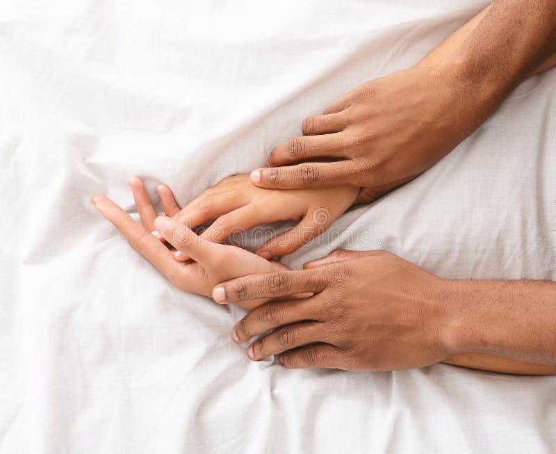 Man and woman hands having sex on bed royalty free stock photos Man and woman hands having sex on bed royalty free stock photos