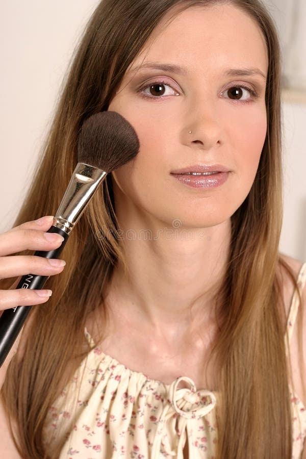 Woman putting make-up stock photo. Image of dressing, putting - 1385382
