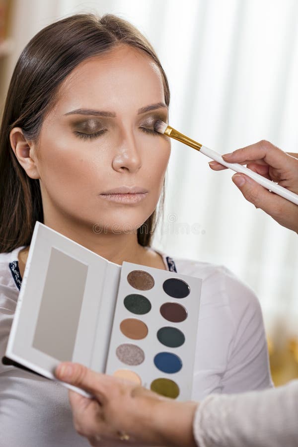 Make Up Artist Shading Client`s Eyes Stock Photo - Image of eyelid